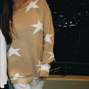 Distressed star sweater